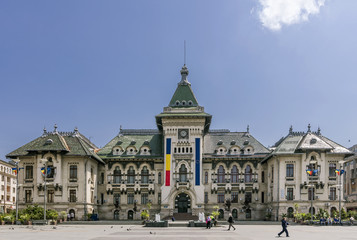 Fototapeta na wymiar Beautiful view of the famous City Hall of Craiova, Romania on a sunny day