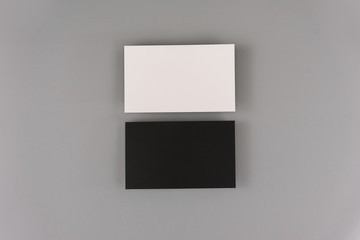 Blank business cards on light background. Mock up for design and branding identity.