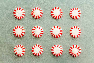 Rows of colorful red and white striped candy