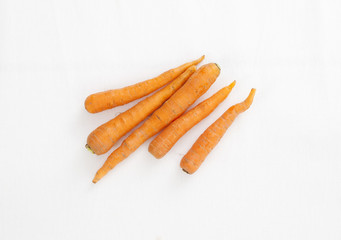 baby carrots on white