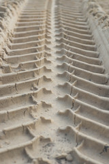 tractor tyre imprints in sand