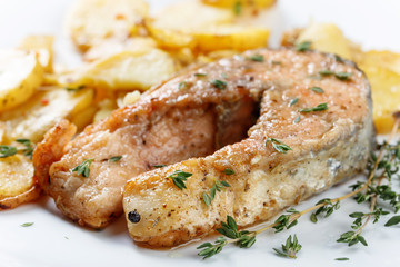 Roasted  salmon with  potatoes.