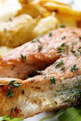 Roasted  salmon with  potatoes.