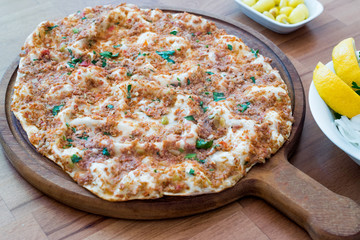 Turkish Food Lahmacun with Minced Meat, Buttermilk Ayran and Salad