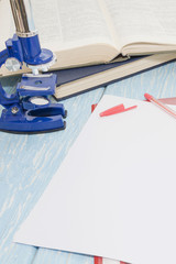 Microscope, books and others tools for education.