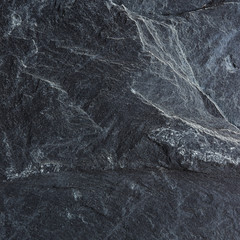 Dark grey black slate background or texture.