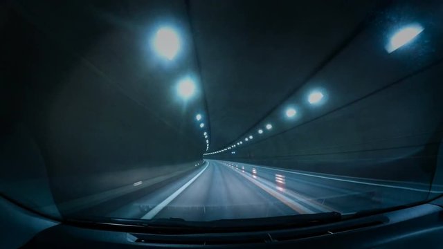 Car POV shot : Blurred motion tunnel. Shot from a slow moving car