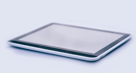 closeup . black tablet pc . isolated on a black background.