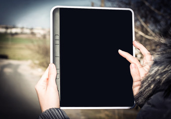 closeup .female hand clicking on a point on the screen of the di