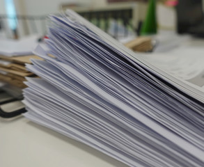 Pile of white paper report
