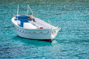 Naklejka premium boat sways on the sea surface