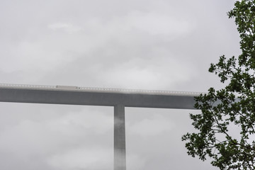 High viaduct with car driving on it