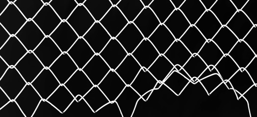 damage wire mesh on black background