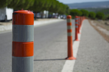 traffic warning cone in row to separate route in road area