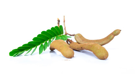 Fresh tamarind isolated on white background ,with leaves.
