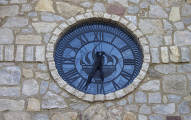 Fototapeta na wymiar Beautiful Blue Clock on Stone Wall