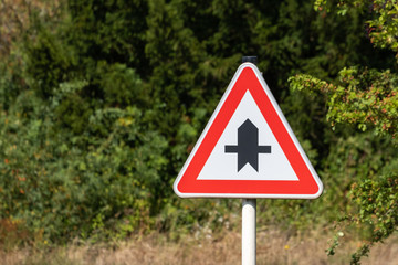 Crossroads with a Minor Road Sign