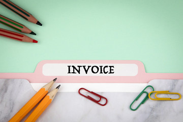 Invoice concept.  Folder Register on Office Table.