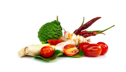 Ingredients Thai spicy soup (Tom-yum) include lemongrass, lime, kaffir lime, tomato,chilli pepper,Galangal on white background.