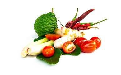 Ingredients Thai spicy soup (Tom-yum) include lemongrass, lime, kaffir lime, tomato,chilli pepper,Galangal on white background