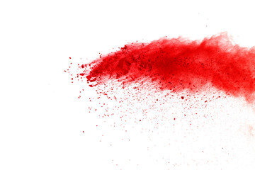 Abstract of red powder explosion on white background. Colored powder splatted isolate. Colored...