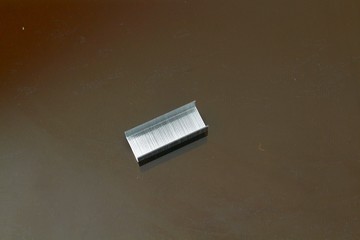 Clips for fastening paper