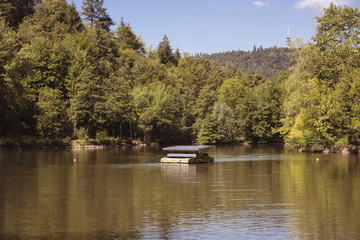 Obraz premium The Waldenecksee in Baden Baden with Solar driven circulating pump. Baden-Wuerttemberg, Germany