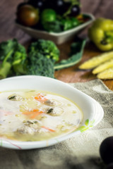 bowl of soup and fresh vegetables