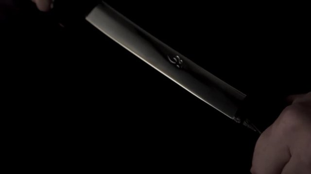 Taking out Japanese sword in the dark