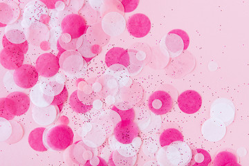 Pink Colorful festive confetti. Flat lay style.