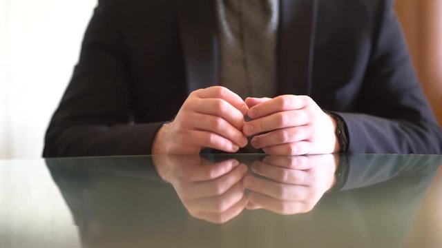 Man Explaining or Interviewing