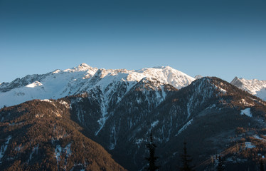 A view of the mountains before heavy snow from the centre of a ski report in the Tirol, Austria