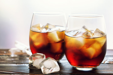 Drink with ice in a glass cup