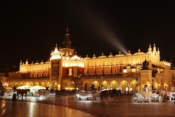 Naklejka na ściany i meble Rynek Sukiennice Krakow city center in the night