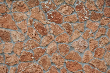 Stone wall texture. Brown stone background