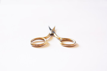 Small manicure scissors isolated on a white background