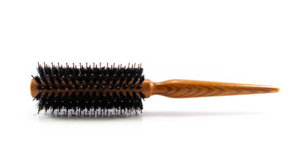 Wooden hairbrushes isolated on white background