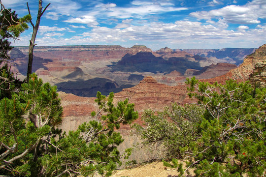 Panoramic view of the Grand Canyon National Park, with clouds casting shadows on the mountains, picture taken from the South Rim, Arizona, USA