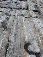 View at Pemaquid Point Lighthouse in Maine of the rocky coastline 