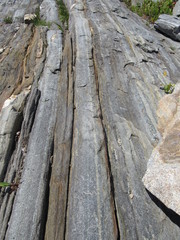 View at Pemaquid Point Lighthouse in Maine of the rocky coastline 