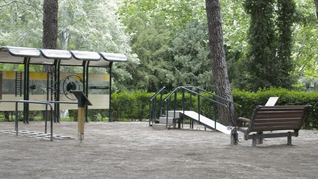 Panning shot of an empty old people fitness park