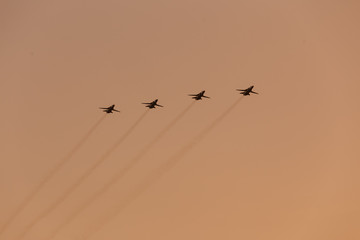 Military aircraft in the sky on the day of the city