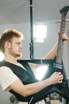 Man playing on electric guitar