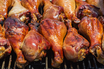 Grilled Turkey Drumsticks at an Outdoor Festival