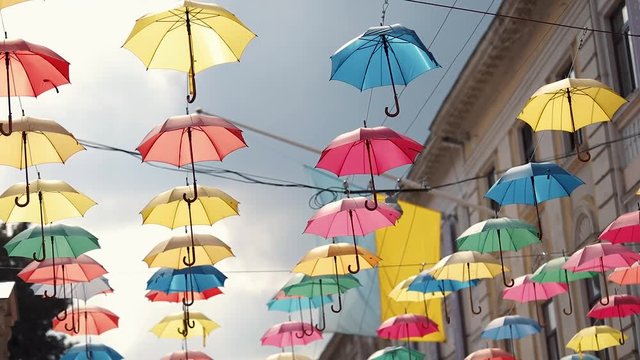 colorful umbrellas hanging in the sky