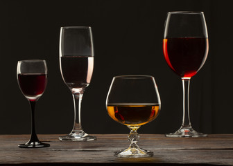 Glass still life image A glass of red wine in a glass on a black background