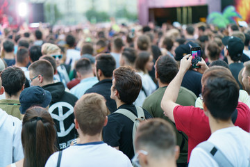 People do photos on the city street