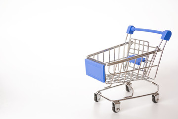 Red Shopping cart or supermarket cart on white background with copy space