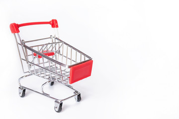 Red Shopping cart or supermarket cart on white background with copy space