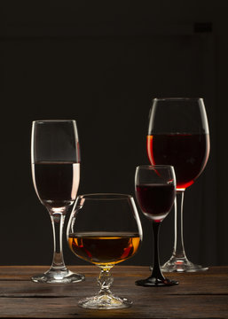 Glass still life image A glass of red wine in a glass on a black background